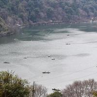 Full view of Naini Lake during evening time near Mall Road in Nainital, Uttarakhand, India, Beautiful view of Nainital Lake with mountains and blue sky photo