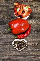 sliced pieces of ripe sweet red pepper photo