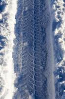 car tire in the snow photo