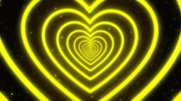 animação amor coração brilhante cor amarela looping infinito e partículas de brilho abstrato romântico - animação de fundo de movimento de loop sem costura 4k video