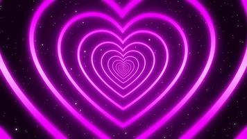 Animation Love Heart Glowing Pink Color Infinite Looping and Romantic Abstract Glow Particles - 4K Seamless Loop Motion Background Animation video