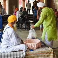 Old Delhi, India, April 15, 2022 - Gurudwara Sis Ganj Sahib is one of the nine historical Gurdwaras in Old Delhi in India, Sheesh Ganj Gurudwara in Chandni Chowk, opposite Red Fort in Old Delhi India photo