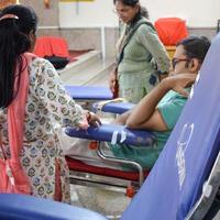 Delhi, India, June 19 2022 - Blood donor at Blood donation camp held at Balaji Temple, Vivek Vihar, Delhi, India, Image for World blood donor day on June 14 every year, Blood Donation Camp at Temple photo