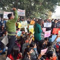 New Delhi, India December 25 2021 - Delhi Contractual Guest Teachers with posters, flags and graffitis protesting against Delhi AAP Government for making policy, Delhi Guest Teachers protesting photo