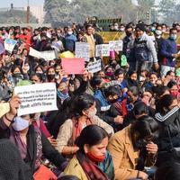 New Delhi, India December 25 2021 - Delhi Contractual Guest Teachers with posters, flags and graffitis protesting against Delhi AAP Government for making policy, Delhi Guest Teachers protesting photo