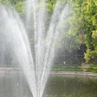 Fountain in the complex of Lodhi Garden in Delhi India, working fountain in the Lodhi Garden complex, water in the fountain, fountain in the Lodhi Garden park during morning time photo