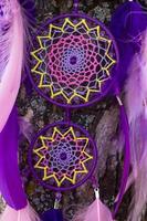 Handmade dream catcher with feathers threads and beads rope hanging photo