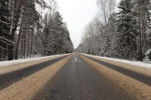 narrow winter road photo