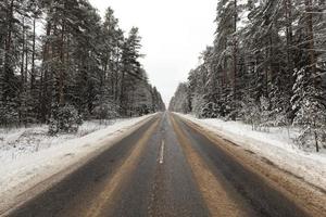 narrow winter road photo