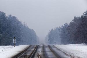 narrow winter road photo