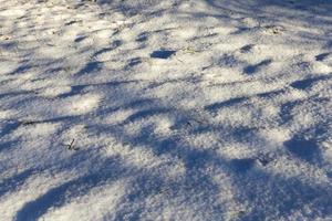 Snow drifts in winter photo