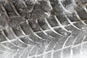 car tire in the snow photo