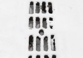 Grate under the snow photo