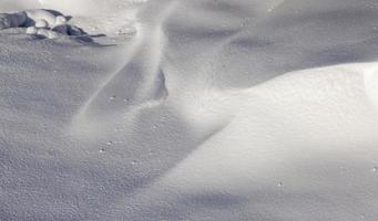 Snow drifts in winter photo