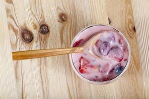 ripe blueberries in yogurt photo