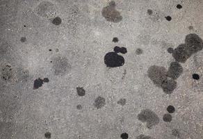 car oil stains on an asphalt road photo