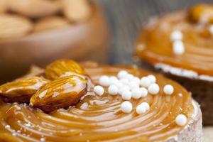 tartlet with milk cheese filling and lots of salted caramel photo