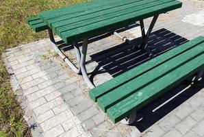 wooden bench and table for recreation photo