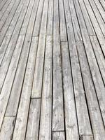 a wooden pier by the lake photo