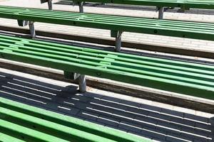 old wooden benches of green color photo