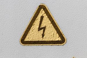 a sign about danger from electricity photo