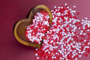 red and white sweet heart shaped candies photo