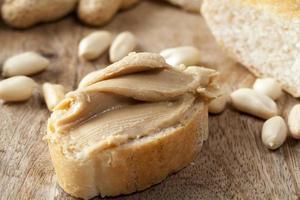 ingredients for preparing a quick Breakfast of bread and peanuts photo