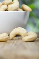 beautiful bent cashew nuts, fresh raw cashew photo