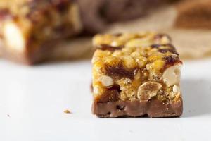 chocolate bar with different nuts photo