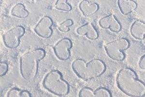 drawn in the winter season, the heart on the snow photo