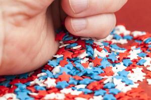 red, blue and white star shaped candies photo