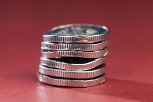 broken bent and rusting metal coins photo