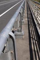 steel fences on the road to ensure the safety of cars photo