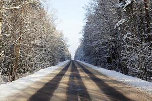 road in the winter season, snowfall in the winter season photo