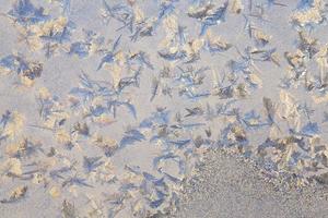 frost on the glass after winter frosts photo