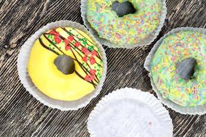 delicious doughnuts with chocolate covered filling, close up photo