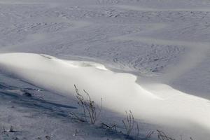 deep snow drifts after the last snowfall photo