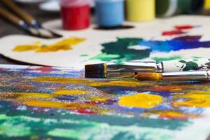 creative process of drawing by mixing different colors photo