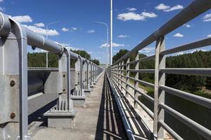 steel fences on the road to ensure the safety of cars photo