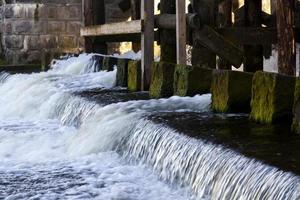 the lower part of a small dam photo