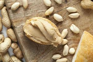 ingredients for preparing a quick Breakfast of bread and peanuts photo