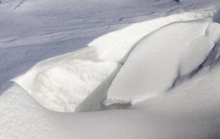 broken snow drift from photo