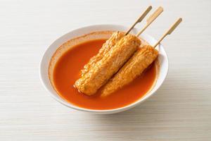 Omuk - Korean fish cake skewer in Korean spicy soup photo