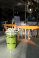 matcha green tea latte blend in glass photo