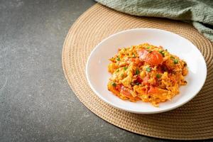 Stir-fried tomatoes with egg or Scrambled eggs with tomatoes photo