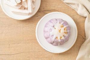 taro bun with white sugar cream and nut photo