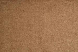la textura del fondo de la alfombra marrón. foto