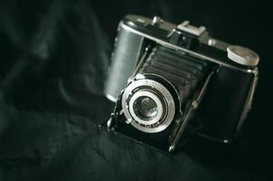 Vintage analog medium format film camera close up view. Vintage film camera with bellows. photo