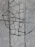 Cracked concrete building or ground cement broken at the outside effect with earthquake photo