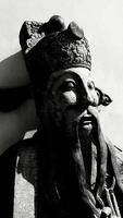 Chinese statue with light and shadow in black and white tone.. photo